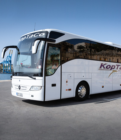 koptaco malta airport transfer point to point bus van minibus company transport service